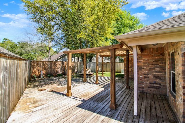 26920 Carriage Manor Lane, Kingwood, TX 77339