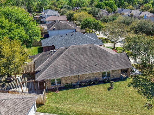 26920 Carriage Manor Lane, Kingwood, TX 77339