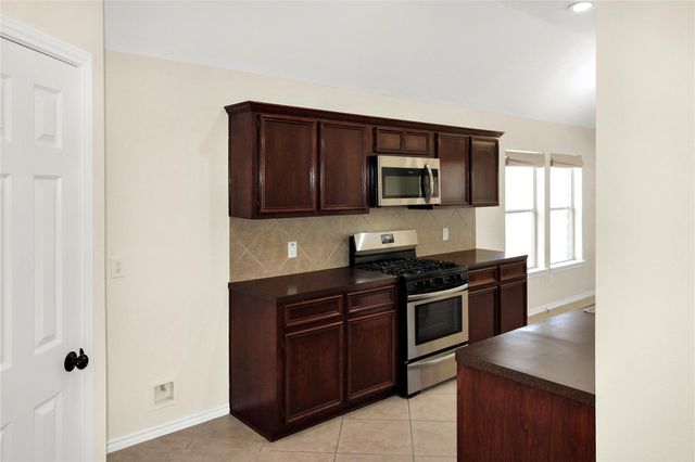 26920 Carriage Manor Lane, Kingwood, TX 77339