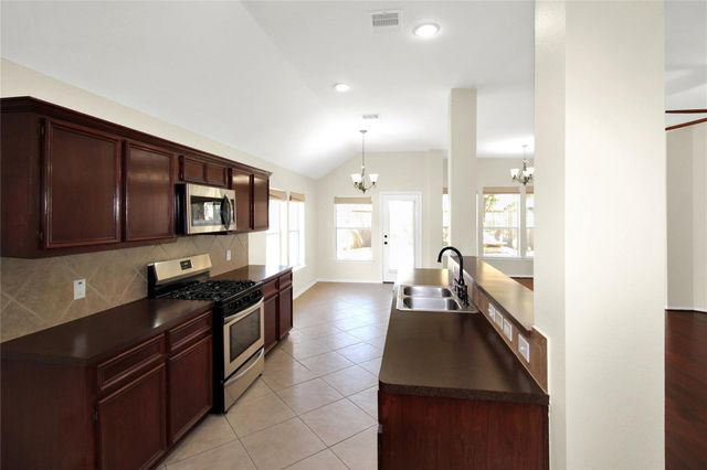 26920 Carriage Manor Lane, Kingwood, TX 77339