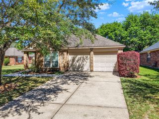 26920 Carriage Manor Lane, Kingwood, TX 77339