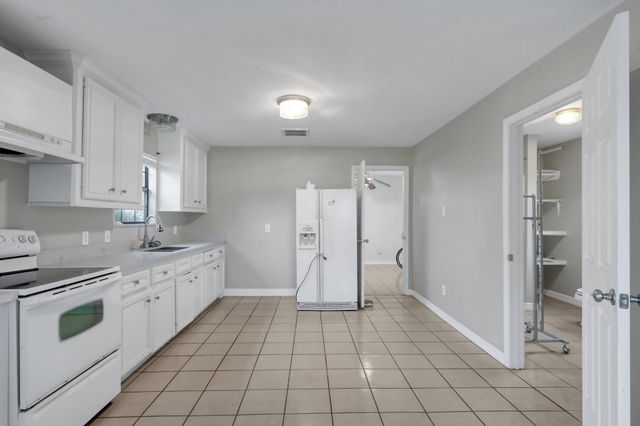 7644 Spring Cypress Road, Spring, TX 77379