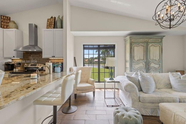 18551 Woodstream Dr, Boca Raton, FL 33498