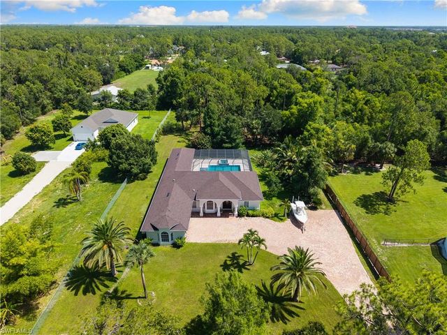 6521 Livingston Woods LN, Naples, FL 34109