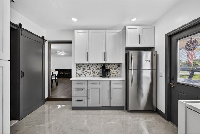 5500 West Place, Mangonia Park, FL 33407