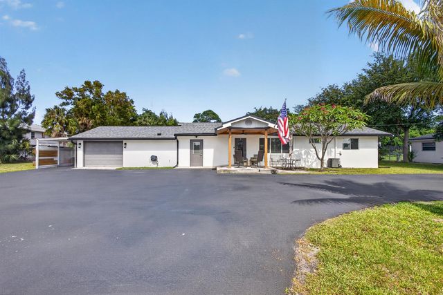 5500 West Place, Mangonia Park, FL 33407