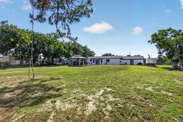 5500 West Place, Mangonia Park, FL 33407