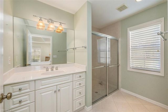 25 Grey Wing PT, Naples, FL 34113