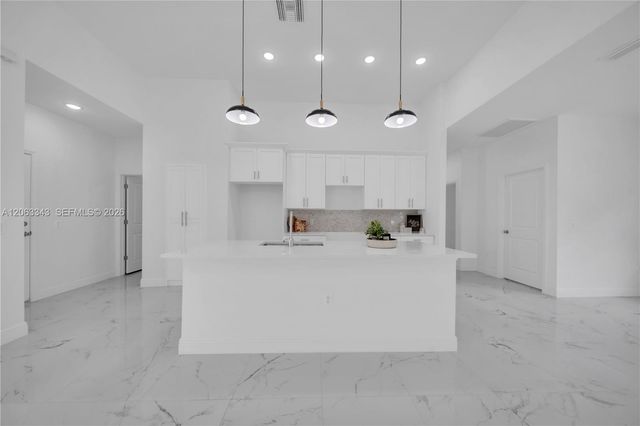 516 DAYTON AVE, Lehigh Acres, FL 33972