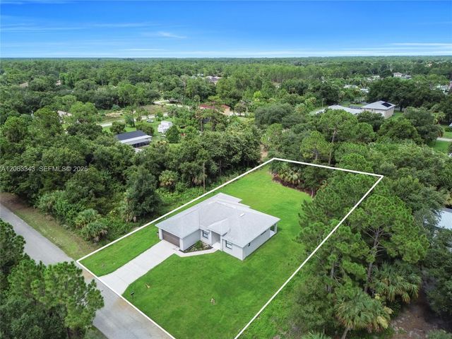 516 DAYTON AVE, Lehigh Acres, FL 33972