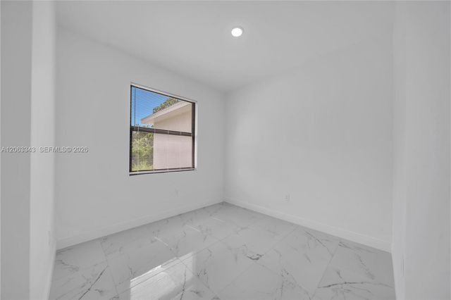 516 DAYTON AVE, Lehigh Acres, FL 33972