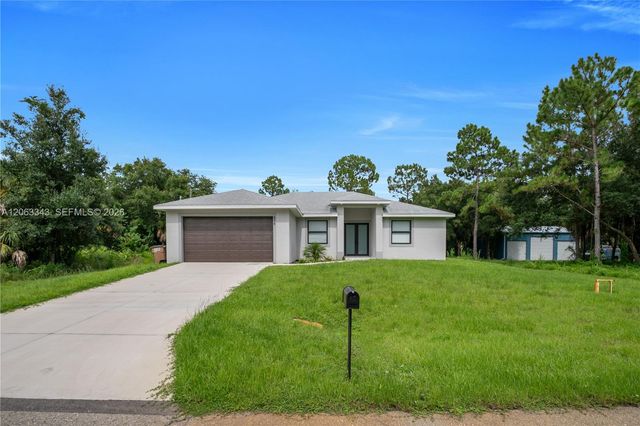 516 DAYTON AVE, Lehigh Acres, FL 33972