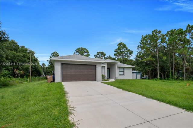 516 DAYTON AVE, Lehigh Acres, FL 33972