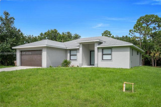 516 DAYTON AVE, Lehigh Acres, FL 33972