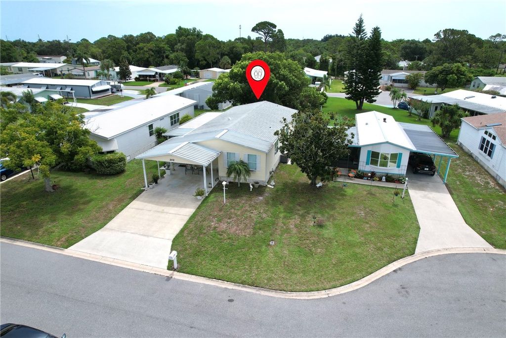202 Swordfish Court, Barefoot Bay, FL 32976