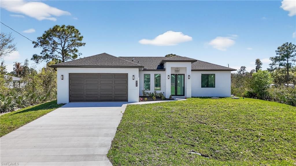 2711 39th ST W, LEHIGH ACRES, FL 33971 — exterior