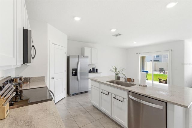 9014 FORGE BREEZE LOOP, Wesley Chapel, FL 33545