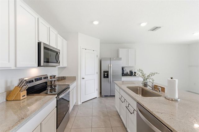 9014 FORGE BREEZE LOOP, Wesley Chapel, FL 33545