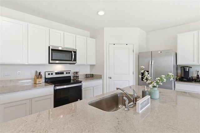 9014 FORGE BREEZE LOOP, Wesley Chapel, FL 33545