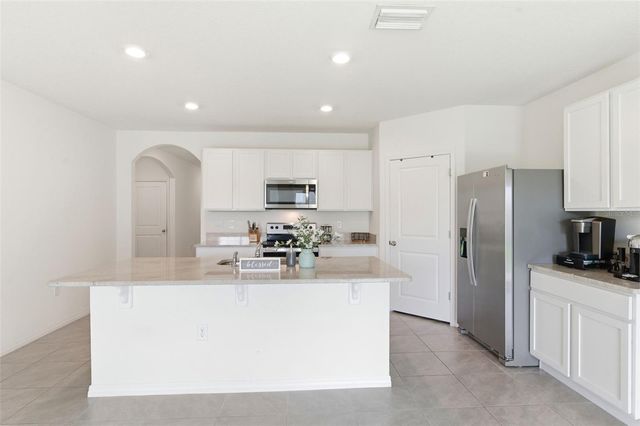 9014 FORGE BREEZE LOOP, Wesley Chapel, FL 33545