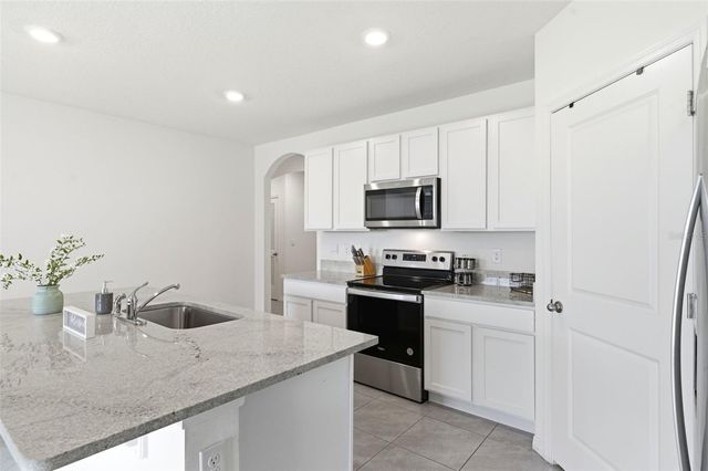 9014 FORGE BREEZE LOOP, Wesley Chapel, FL 33545
