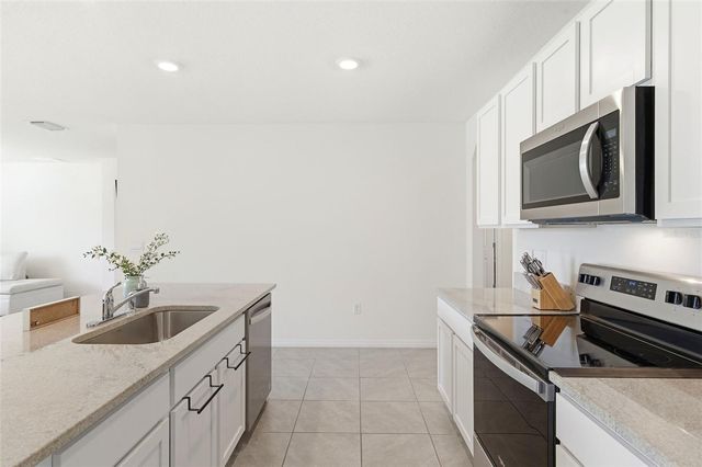 9014 FORGE BREEZE LOOP, Wesley Chapel, FL 33545