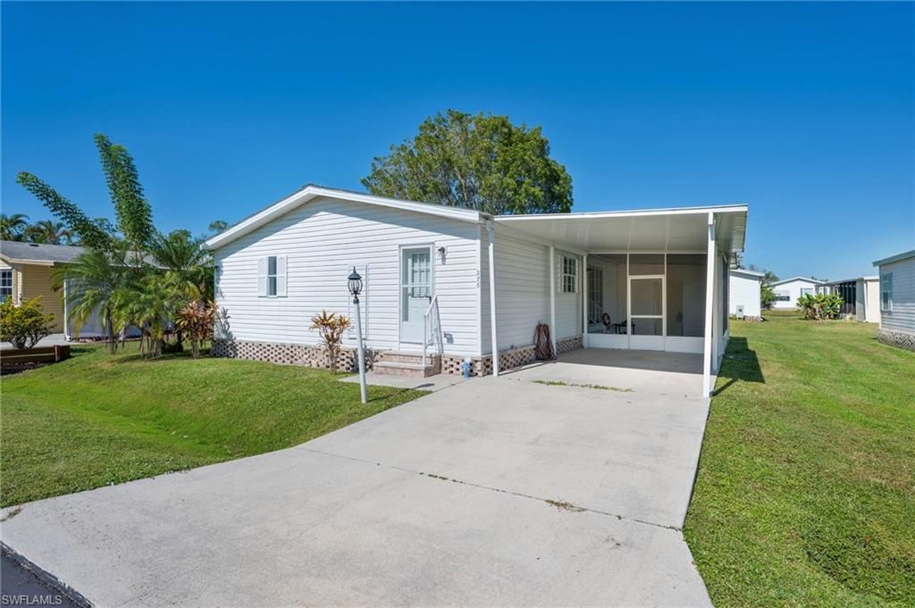 276 Grosbeak LN # 276, NAPLES, FL 34114 — exterior