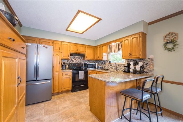 1306 HUNTINGTON Circle, Greenwood, MO 64034