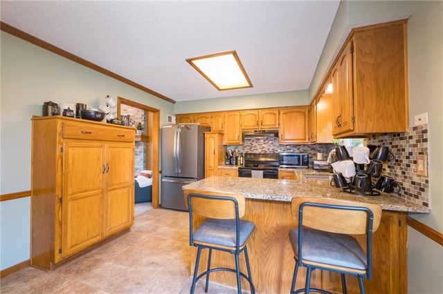 1306 HUNTINGTON Circle, Greenwood, MO 64034