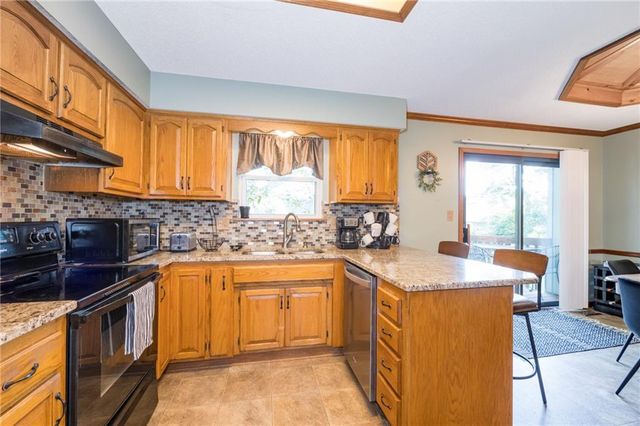 1306 HUNTINGTON Circle, Greenwood, MO 64034