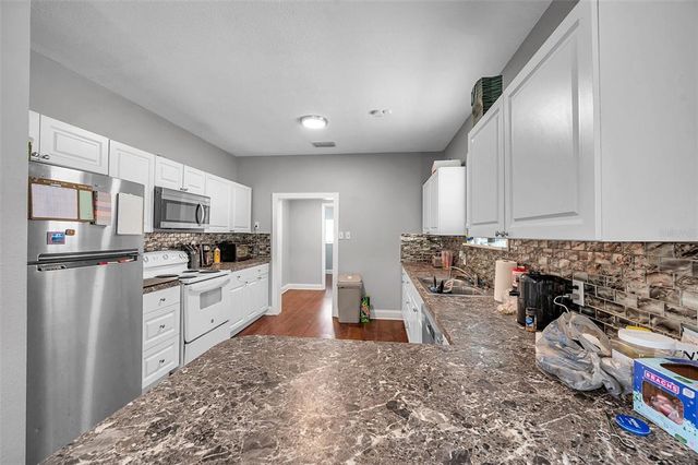 1318 E LOUISE AVENUE, Tampa, FL 33603