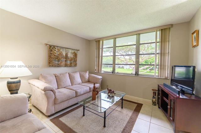 4221 W Palm Aire Drive 203, Pompano Beach, FL 33069
