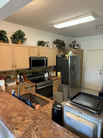 1102 Woodfield Road, Greenacres, FL 33415