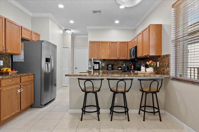 114 Lancaster Way, Royal Palm Beach, FL 33414