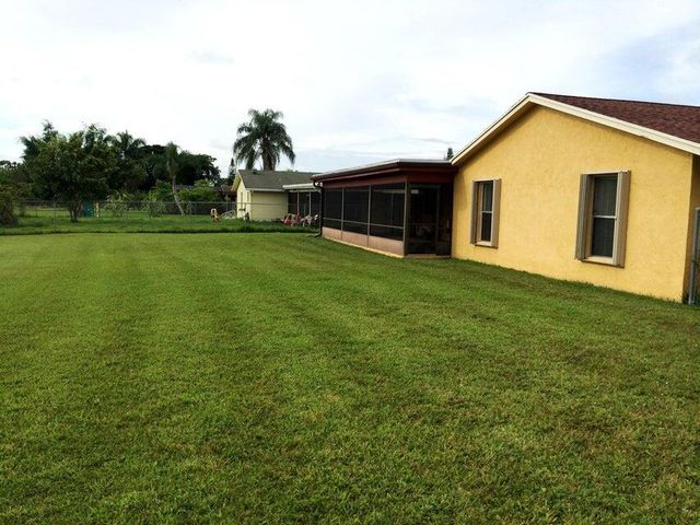 221 Bilbao Street, Royal Palm Beach, FL 33411