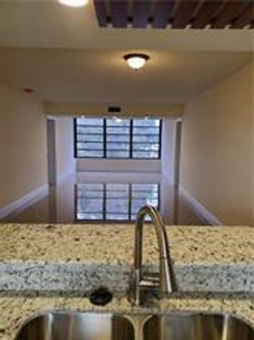 1719 WHITEHALL Drive 303, Davie, FL 33324