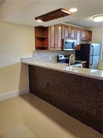 1719 WHITEHALL Drive 303, Davie, FL 33324