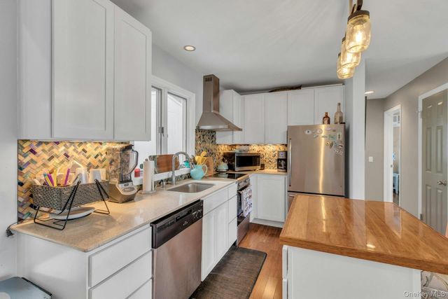 53 W End Avenue, East Quogue, NY 11942