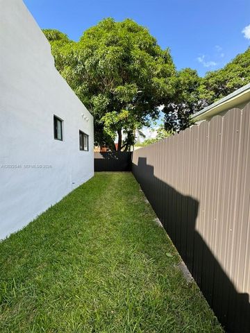 557 NW 44st front, Miami, FL 33127