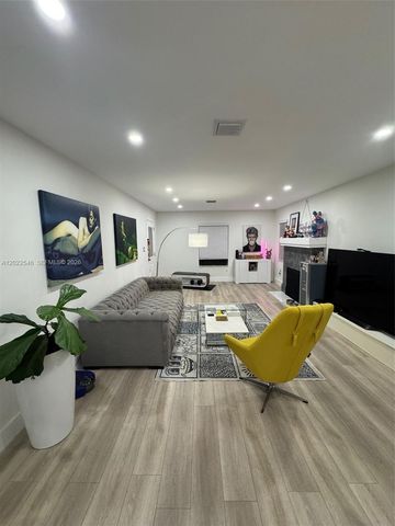 557 NW 44st front, Miami, FL 33127