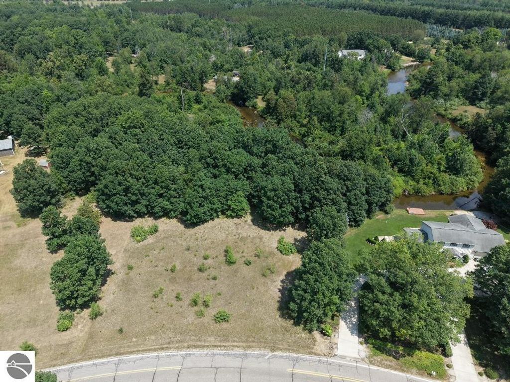 Image 2 of property listing at 1033 & 1035 Bonanza Lane, Weidman, MI 48893