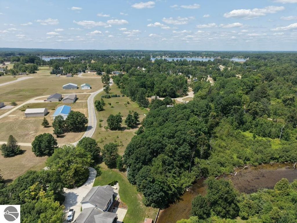 Image 3 of property listing at 1033 & 1035 Bonanza Lane, Weidman, MI 48893