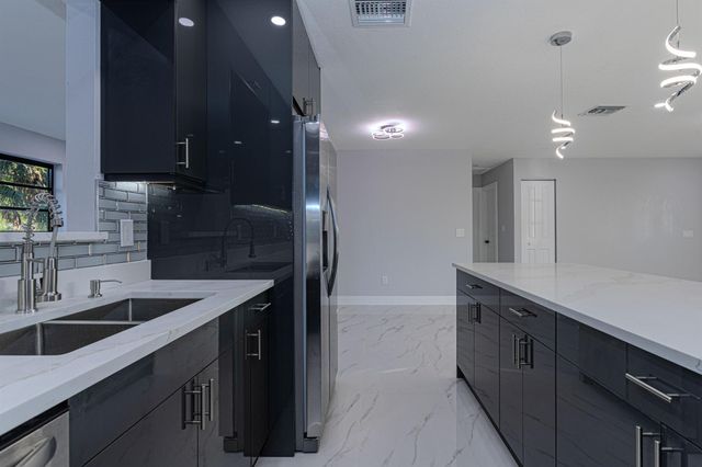 62 Andros Road, Palm Springs, FL 33461