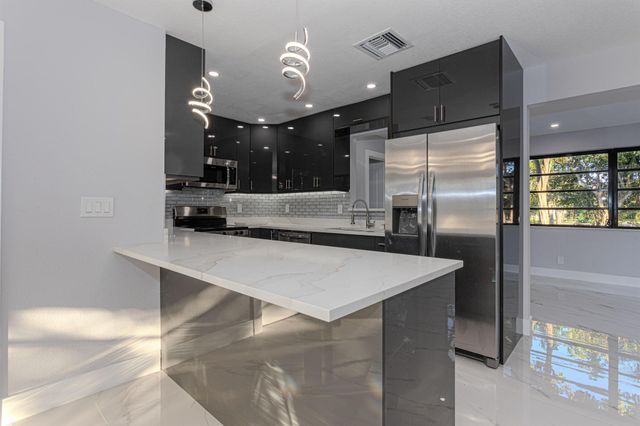 62 Andros Road, Palm Springs, FL 33461