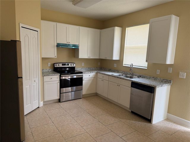 933 WHISPERING CYPRESS LANE, Orlando, FL 32824