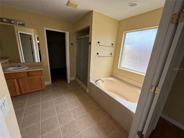933 WHISPERING CYPRESS LANE, Orlando, FL 32824