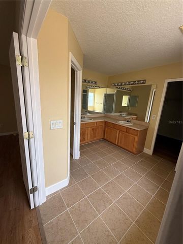 933 WHISPERING CYPRESS LANE, Orlando, FL 32824