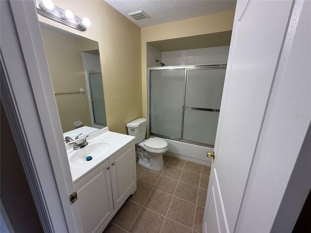 933 WHISPERING CYPRESS LANE, Orlando, FL 32824