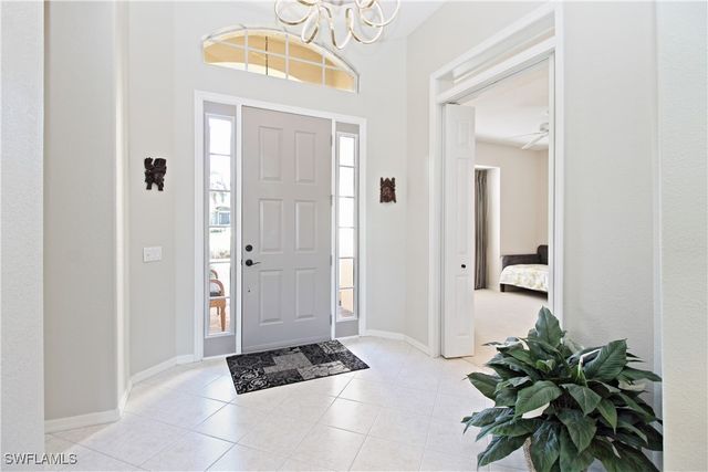 1842 Winding Oaks WAY, Naples, FL 34109