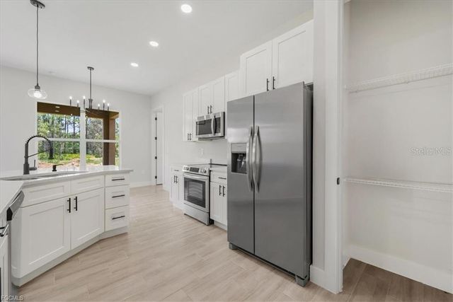 430 MERCEDES COURT, Lehigh Acres, FL 33972